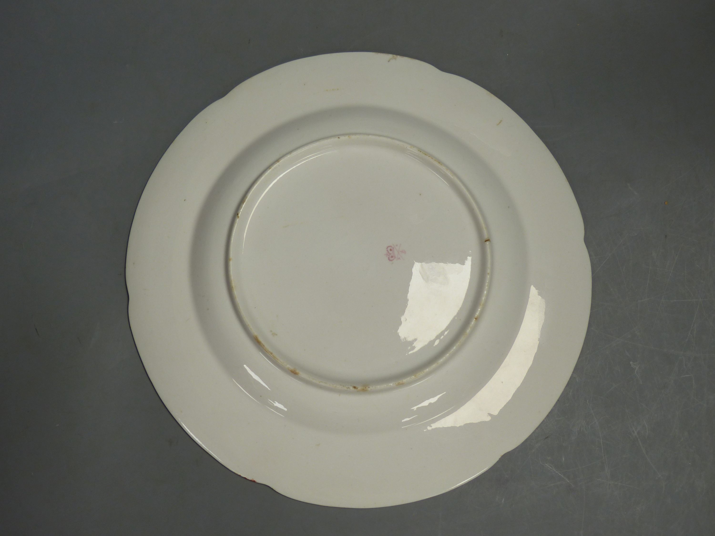 A Derby plate painted with central bird and leafy chains, c.1800, diameter 26.5cm